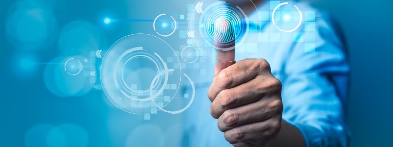 Businessman using fingerprint identification to access and prote Businessman using fingerprint identification to access and protecting data personal information on cyber security network. Data protection privacy concept