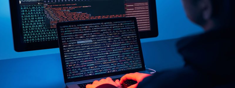Man using computer and programming to break code. Cyber security threat. Internet and network security. Stealing private information. Person using technology to steal password and private data. Cyber attack crime Man using computer and programming to break code. Cyber security threat. Internet and network security. Stealing private information. Person using technology to steal password and private data. Cyber attack crime